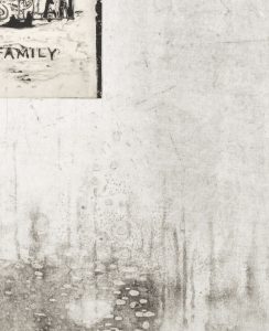 Weathered concrete wall with graffiti text and water stains damage
